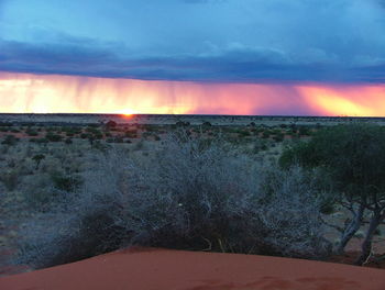 Scenic view of dramatic sky during sunset