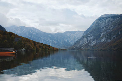 Autumn view of the beautiful bohinj lake with stunning transparent water against mountains.