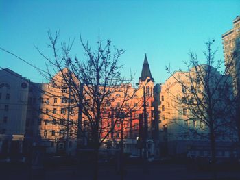 Buildings in city at dusk