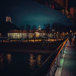 Illuminated buildings in city at night