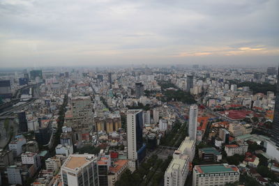 High angle view of buildings in city against sky