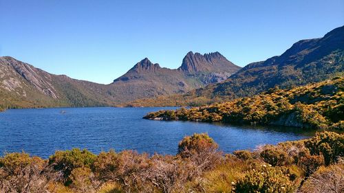 Idyllic shot of cradle mountain and lake st clair against clear sky
