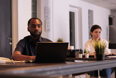 Businesswoman working at desk in office