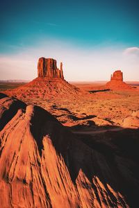 Scenic view of monument valley against sky