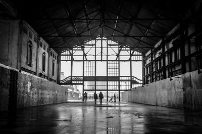 People walking at covered walkway