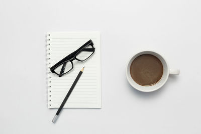 High angle view of coffee cup on table