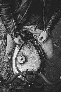 High angle view of man working at machine