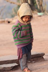 Child standing outdoors