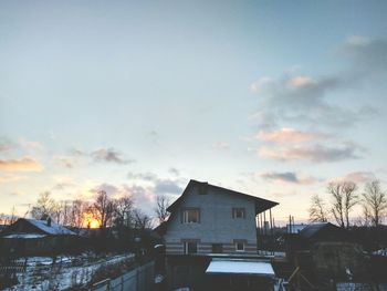 Built structure against sky during sunset