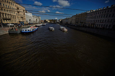 Boats moored in canal