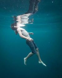 Full length of woman swimming in sea