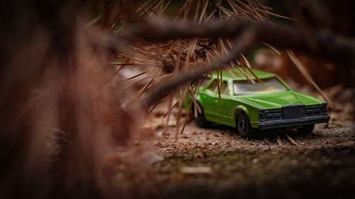 Close-up of toy car on field