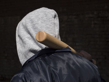 Rear view of person wearing hat