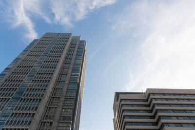 Low angle view of modern buildings against sky