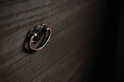 High angle view of wedding rings on table