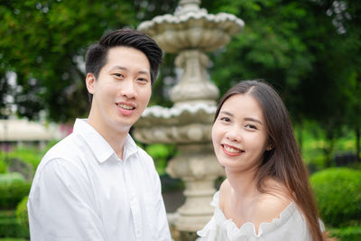 Portrait of smiling young couple