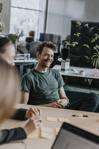 Smiling man during business meeting