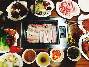 High angle view of sushi served on table