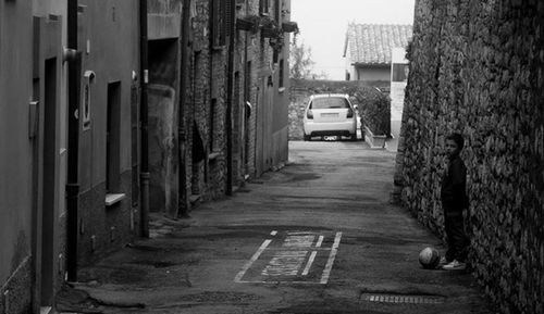 Narrow alley amidst buildings