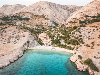 High angle view of rocks by sea