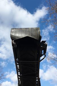 Low angle view of water tower against sky