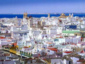 Cityscape against clear blue sky