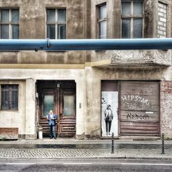 People in front of building