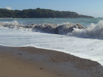 Scenic view of beach against sky