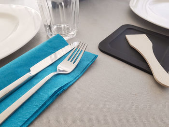 Close-up of kitchen utensils on table