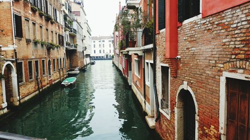 Narrow canal along buildings