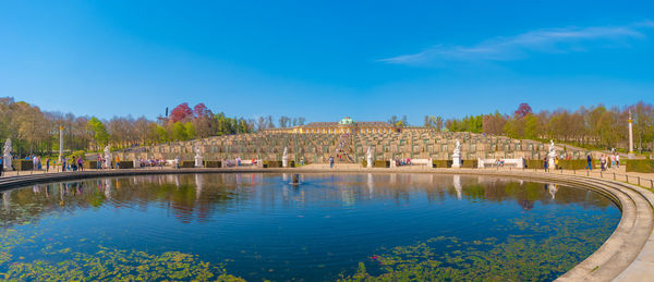 Scenic view of lake against blue sky