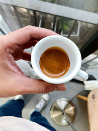 High angle view of coffee cup on table