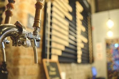 Row of draft beer taps at a bar. beer taps in a row in perspective. close up of beer tap. 