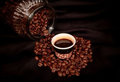 Close-up of coffee beans on table