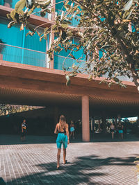 Full length of people in building