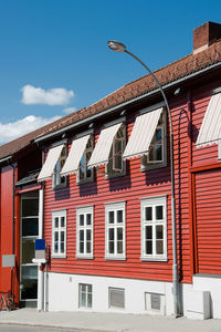 Low angle view of building against blue sky