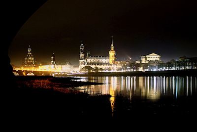 Bridge over river at night