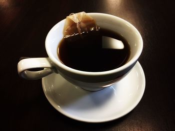 High angle view of coffee cup on table