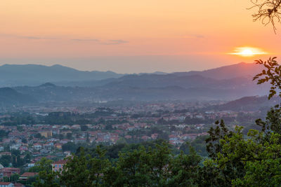 High angle view of townscape against sky during sunset