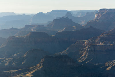 Aerial view of landscape with mountain range in background