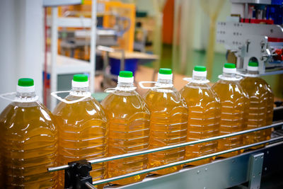 Bottling line of palm oil in bottles. 