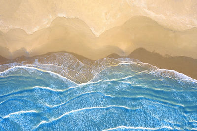 Aerial view of swimming pool by sea