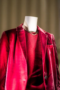 Close-up of clothes hanging on sofa at home