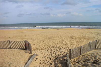 Scenic view of beach against sky