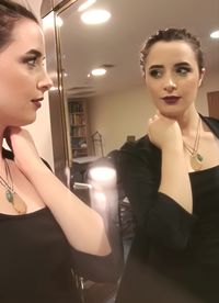 Close-up of beautiful young woman in store