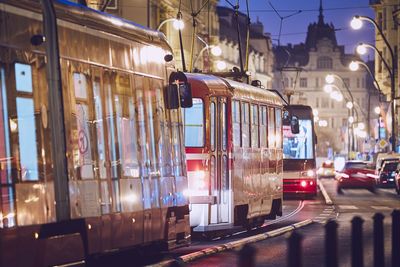 Tramway in illuminated city