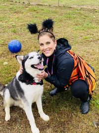 Butterfly girl and husky dog