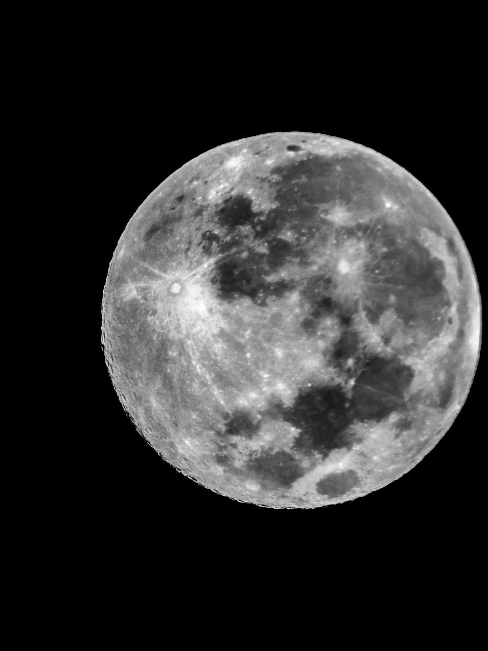 LOW ANGLE VIEW OF MOON IN SKY