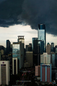 Modern buildings in city against sky