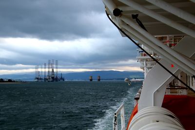 Scenic view of bay against sky